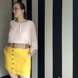 Yellow mini skirt with belt